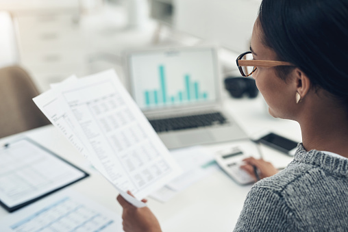 A lady conducting a tax audit